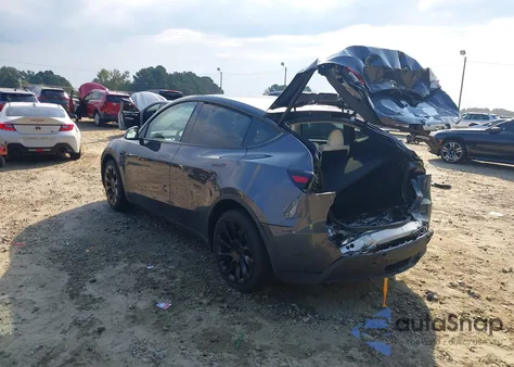 2023 Tesla Model Y Awd/Long Range Dual Motor All-Wheel Drive z USA, uszkodzony, nr VIN 7SAYGDEE4PA167984